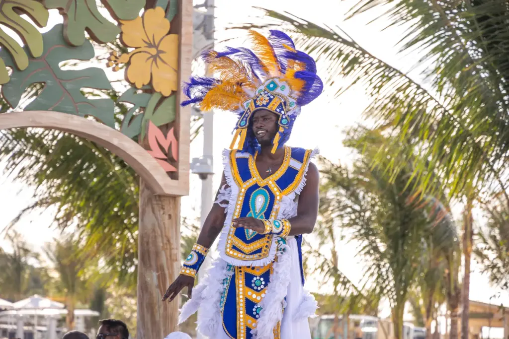 A Bahamian performer helps cut the ribbon on RelaxAway, Half...