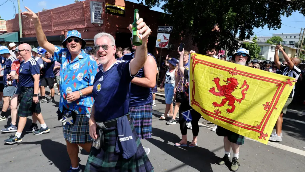 World Cup fans participate in the Scotland Tartan Army march through Little Havana to loanDepot park in Miami on Monday. (Carline Jean/South Florida Sun Sentinel)