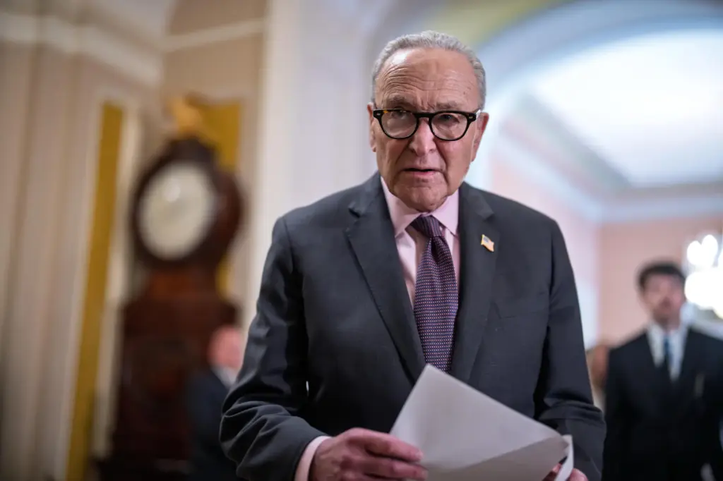 Senate Minority Leader Chuck Schumer, D-N.Y., talks to reporters about...