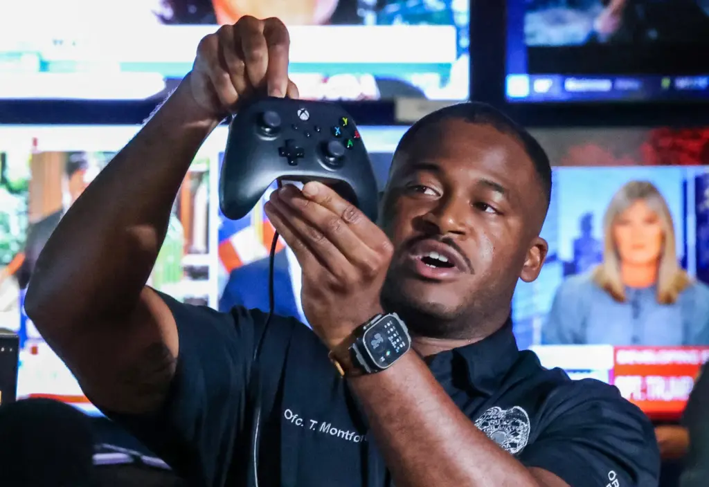 Orlando Police drone pilot Officer Todd Montford shows the flight...