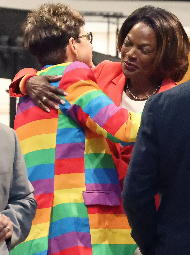 Orlando Commissioner Patty Sheehan (left) hugs former US Rep. Val...