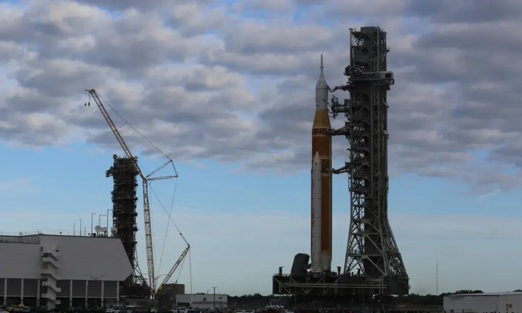 The mobile launcher 2 tower remains under construction adjacent the...