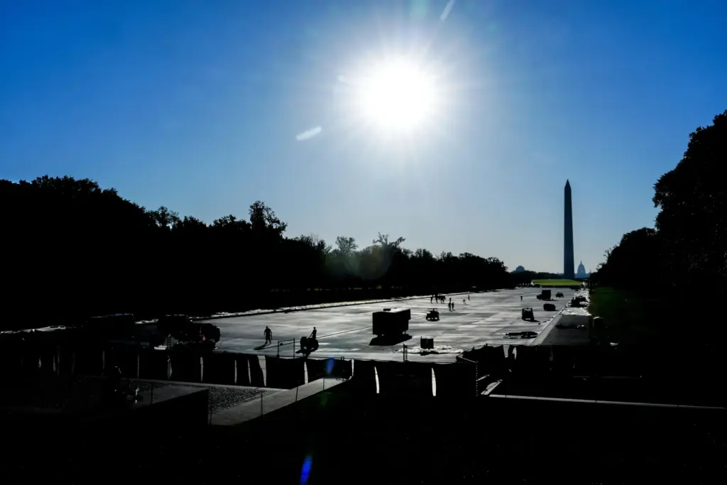 Work continues on the Lincoln Memorial Reflecting Pool after it...