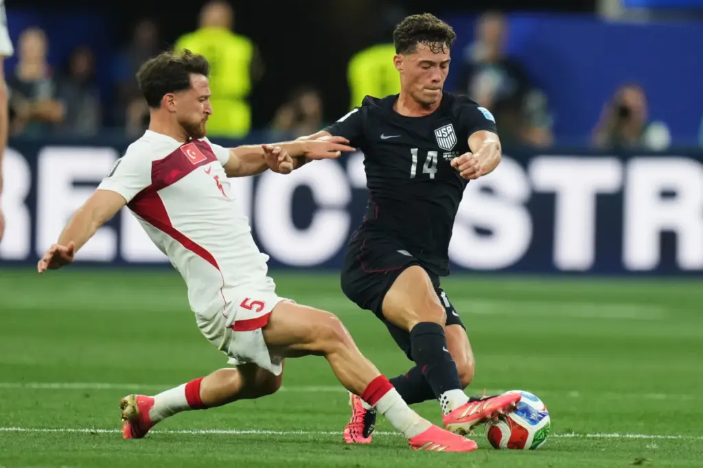 United States’ Sebastian Berhalter (14) and Turkey’s Salih Ozcan battle...