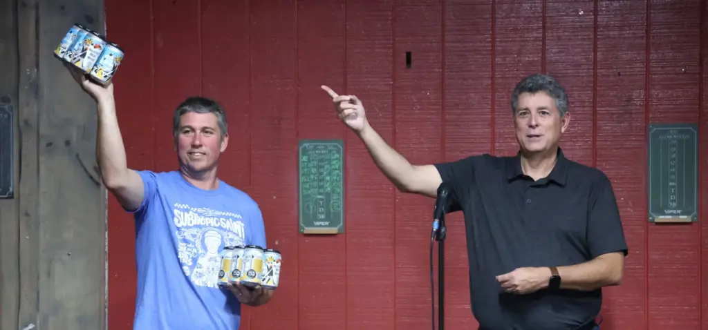 Ten10 Brewing owner Mike Wallace, left, and Orlando Sentinel Executive...