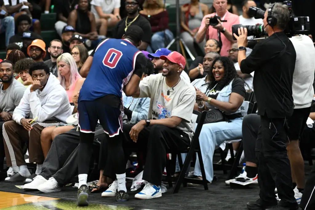 Team DCâs Zaid âZekeâ Hearst (0) shares a laugh with...