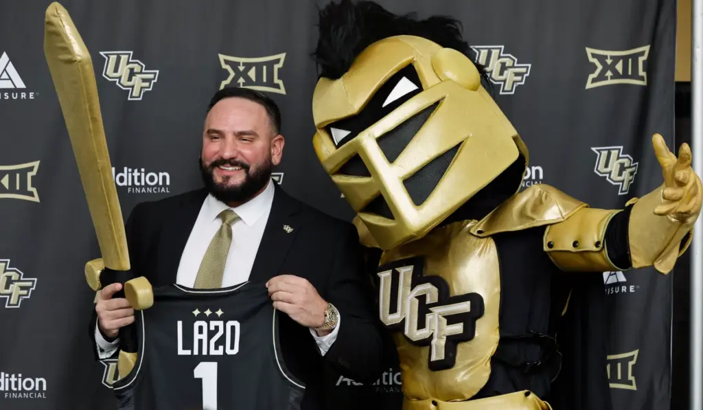 Gabe Lazo, the new UCF women's basketball coach, poses for...