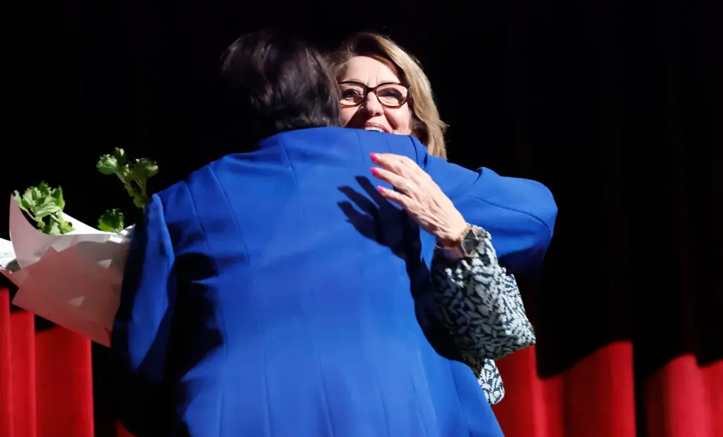 Orange County Public Schools Superintendent Maria Vazquez, left, gets a...