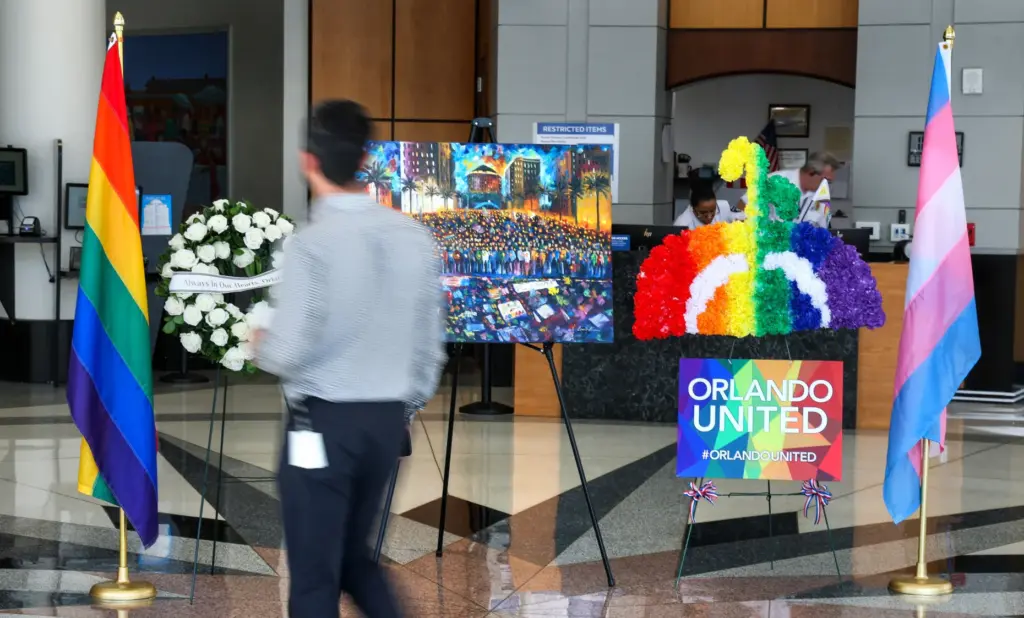 REMEMBERING PULSE â A memorial of flowers and flags in...