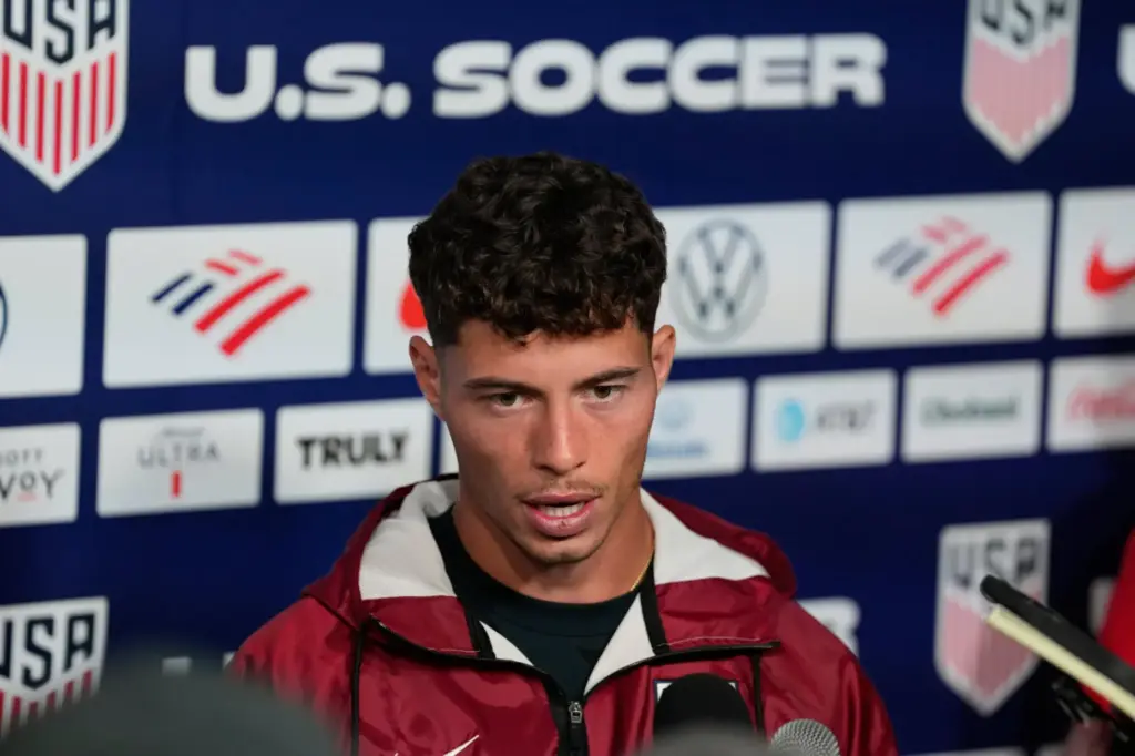 United States’ Sebastian Berhalter speaks with the media before a...
