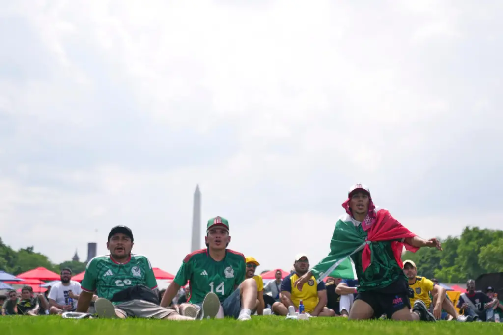 Fans gather to watch the first match of the World...