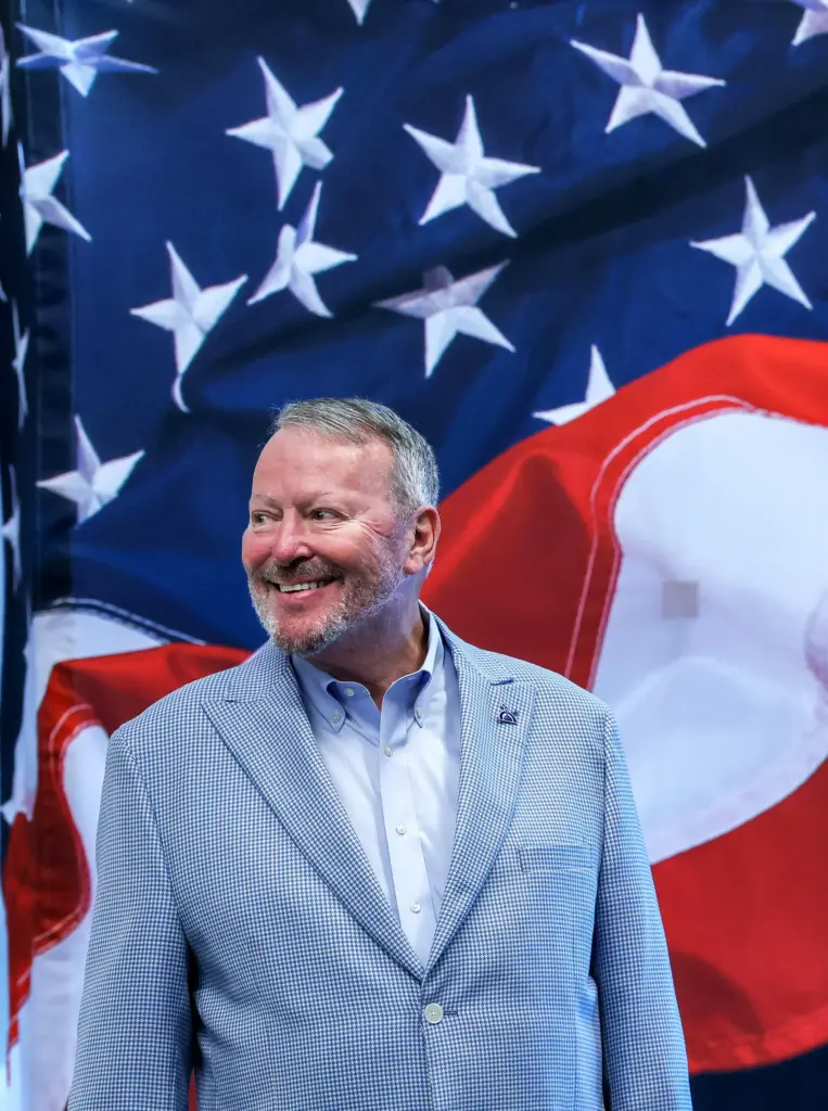 Orlando Mayor Buddy Dyer prepares to watch a demonstration of...