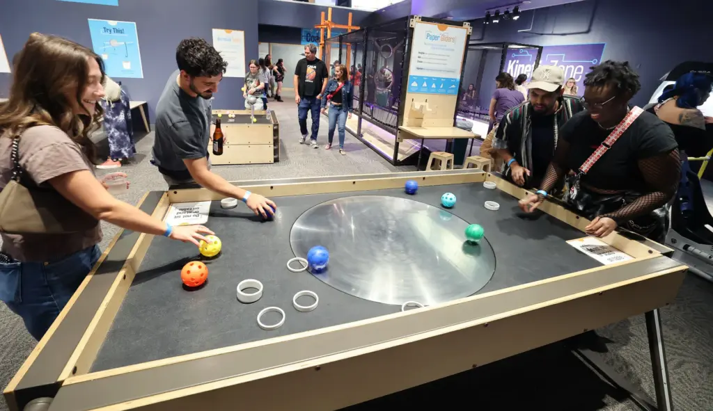Guests enjoy a game during Orlando Science Centerâs Science Night...