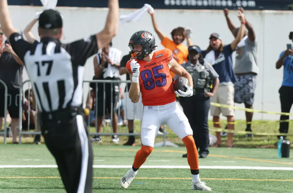 Storm wide receiver Jerome Kapp celebrates after a touchdown call...