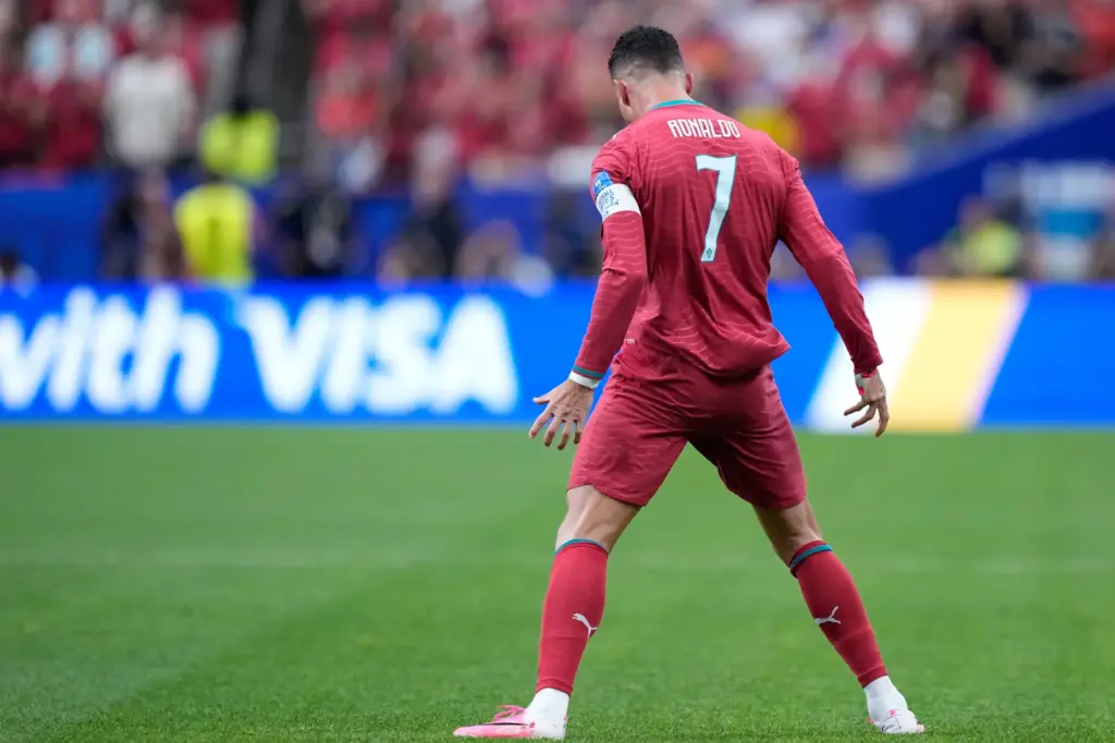 Portugal’s Cristiano Ronaldo celebrates after scoring the opening goal during...