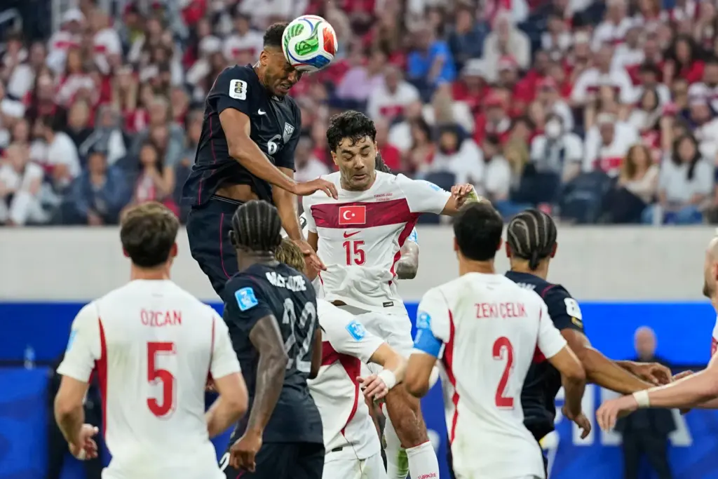 United States’ Auston Trusty (6) heads the ball on goal...