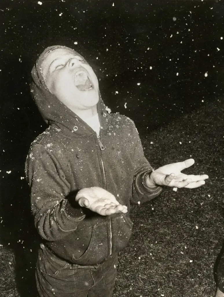 Greg Ingraham tries to catch a mouthful of snow in...