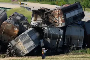 One dead and another injured after train strikes semi-truck in Iowa