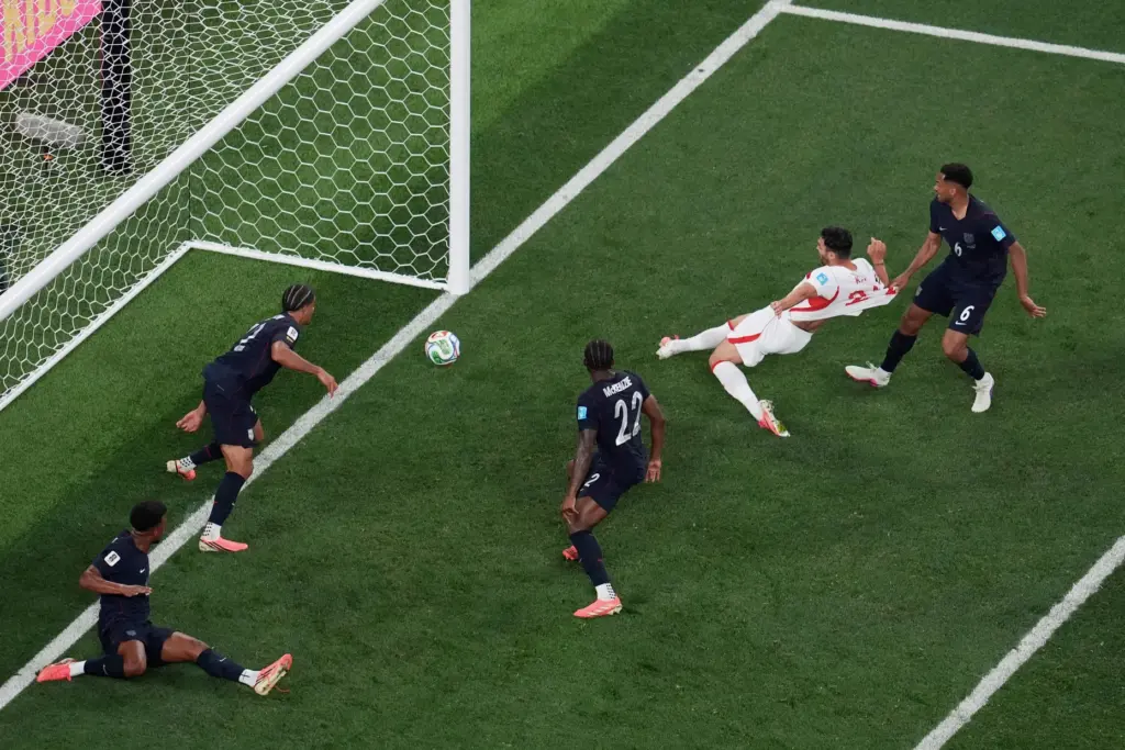 Turkey’s Kaan Ayhan, second from right, scores their third goal...