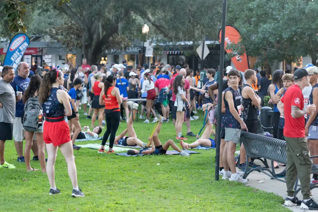 Runners stretch before the Watermelon 5K at Central Park in...