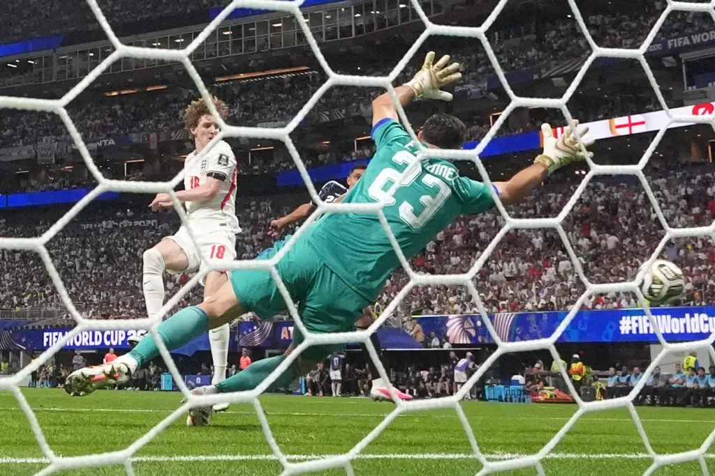 England’s Anthony Gordon (18) scores their opening goal during the...