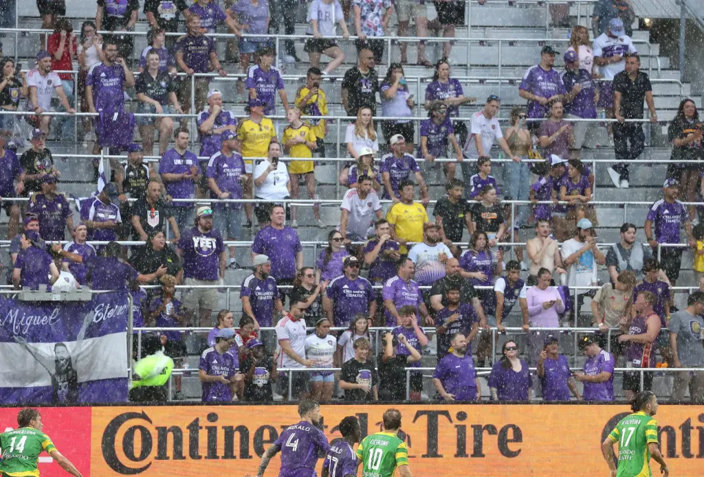 Orlando City fans brave the rain during the Tampa Bay...