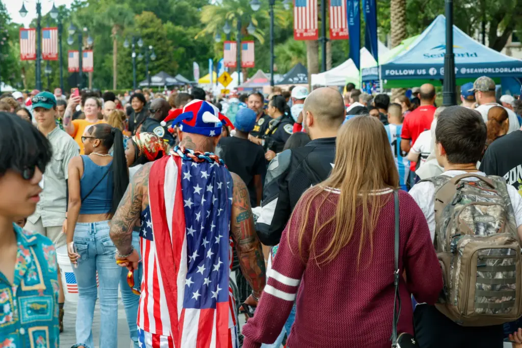 Red, Hot and Boom attendees wander through Cranes Roost Park...