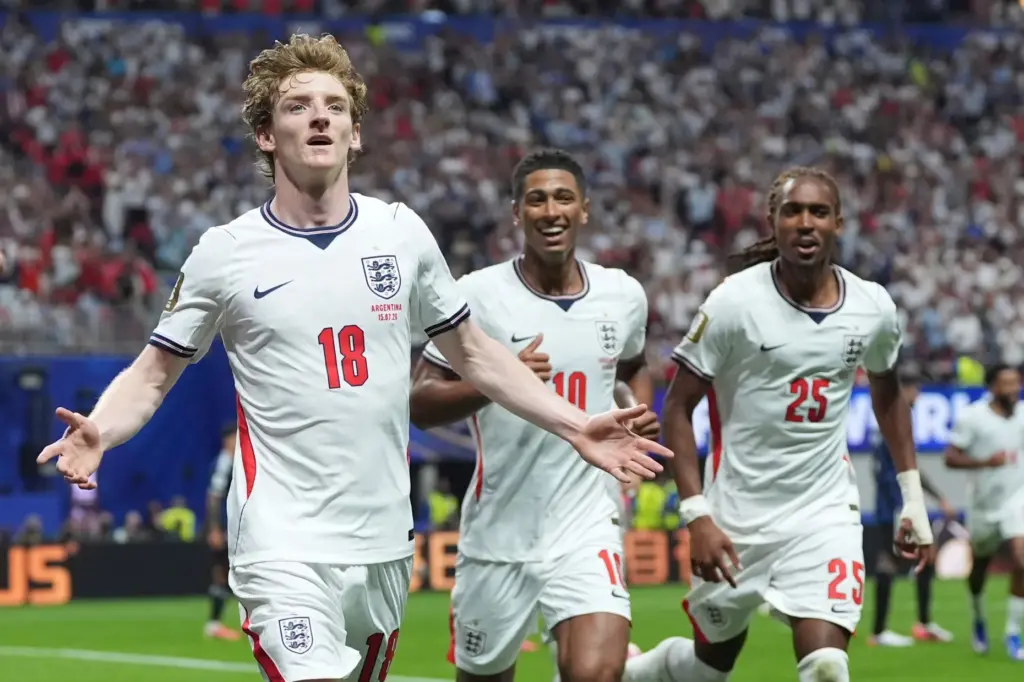 England’s Anthony Gordon (18) celebrates after scoring the opening goal...