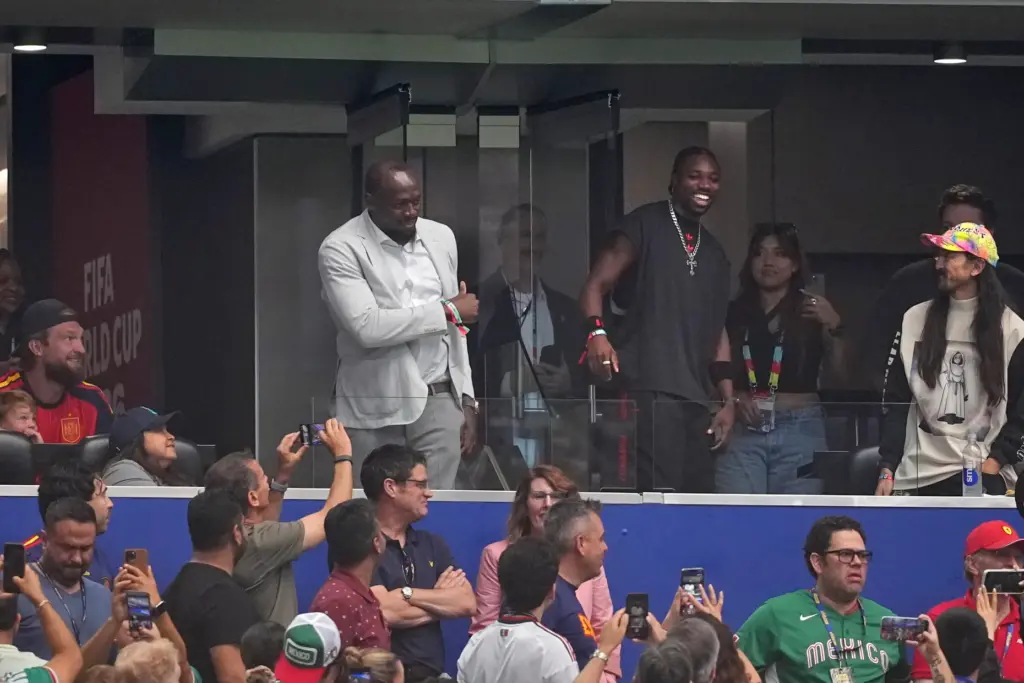 Jamaican sprint great Usain Bolt and US sprinter Noah Lyles,...