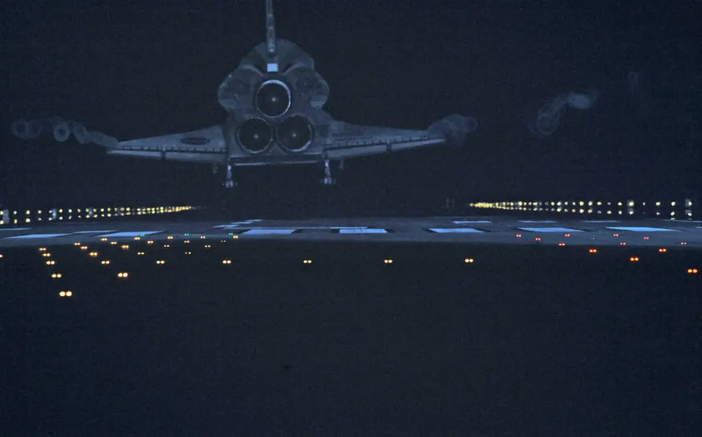 Space Shuttle Atlantis on the STS-135 mission lands at 5:57...