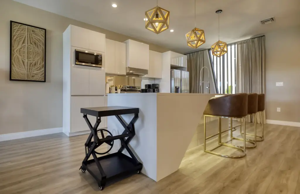 The kitchens at Magic Village by Pininfarina include top of...