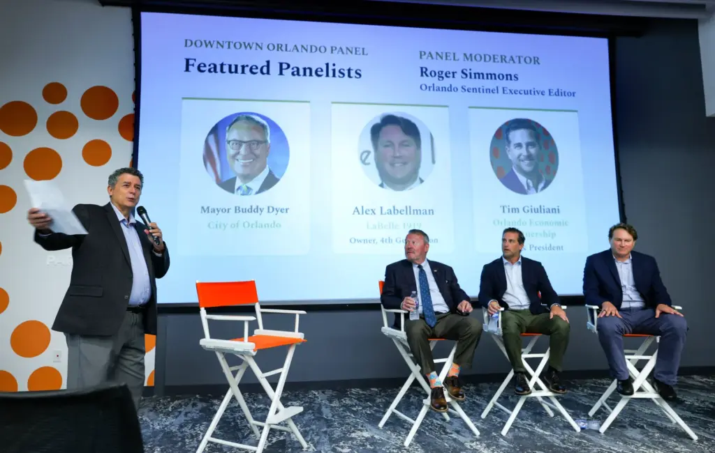 DISCUSSING DOWNTOWN â Orlando Sentinel executive editor Roger Simmons introduces...