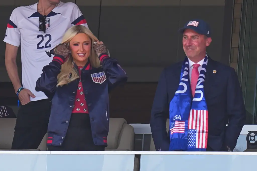 Paris Hilton prepares to watch the World Cup round of...