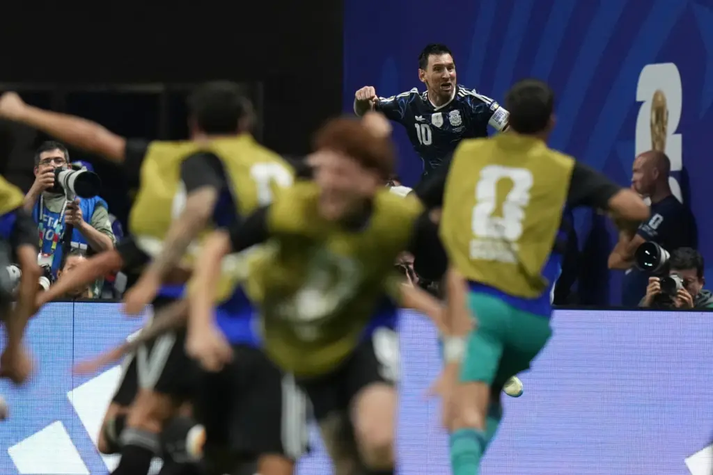 Argentina’s Lionel Messi (10) cerebrates the second goal of his...