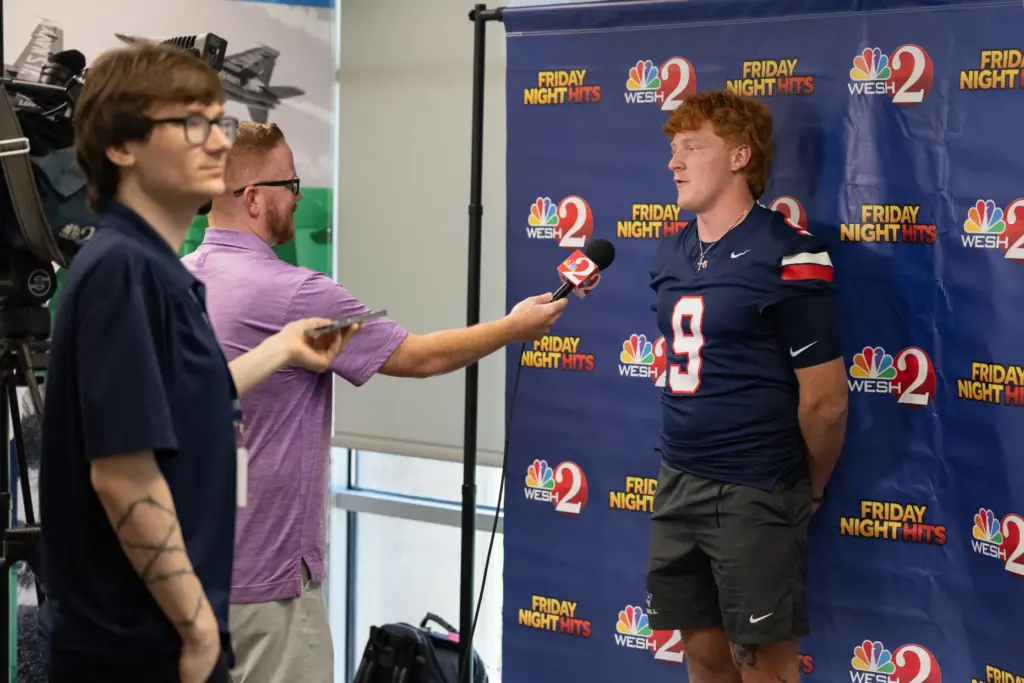Quarterback Jackson Stecher from Lake Brantley High School interviews with...