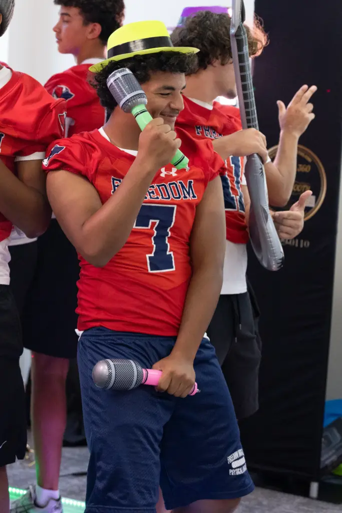 Player from Freedom High School dances for a 360 video...