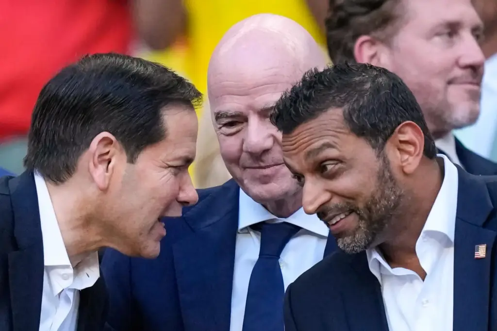 Secretary of State Marco Rubio talks with FBI Director Kash Patel and FIFA President Gianni Infantino.