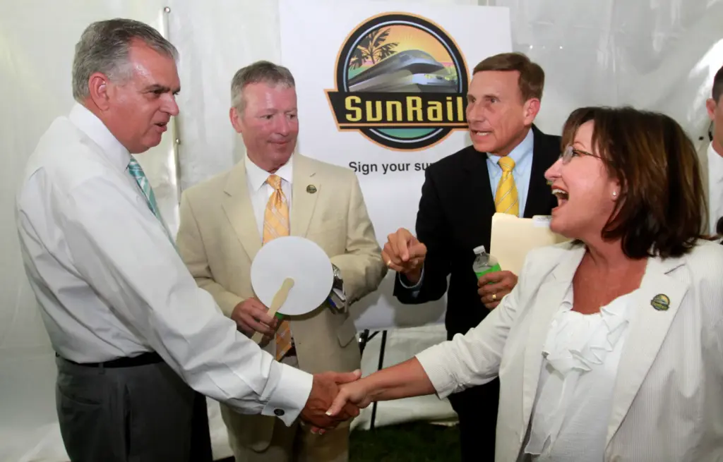 U.S. Secretary of Transportation Ray LaHood, left, gets a warm...