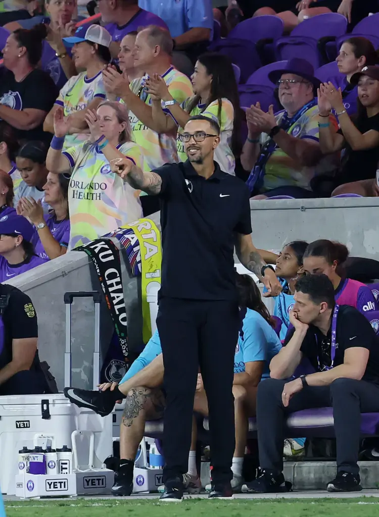 Orlando coach Seb Hines celebrates during the Kansas City Current...