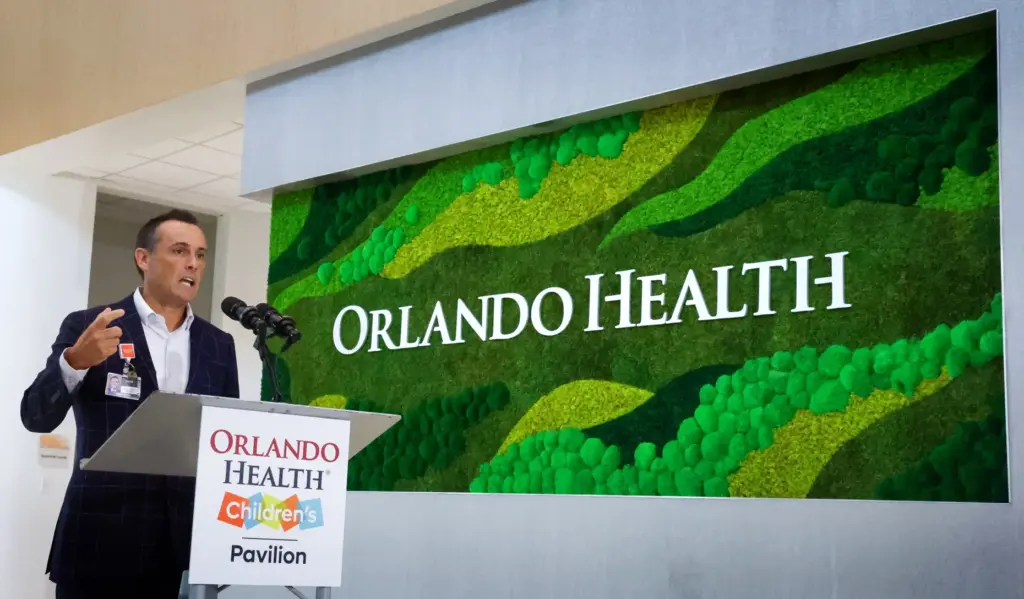 Senior vice president Justin Williams delivers remarks during the opening...