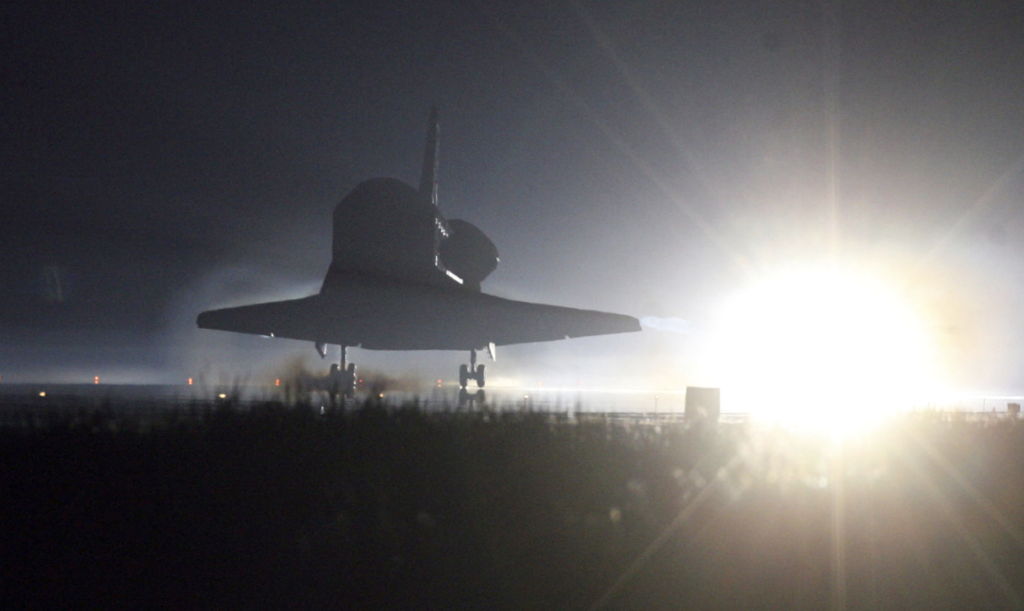 Space Shuttle Atlantis on the STS-135 mission lands at 5:57...