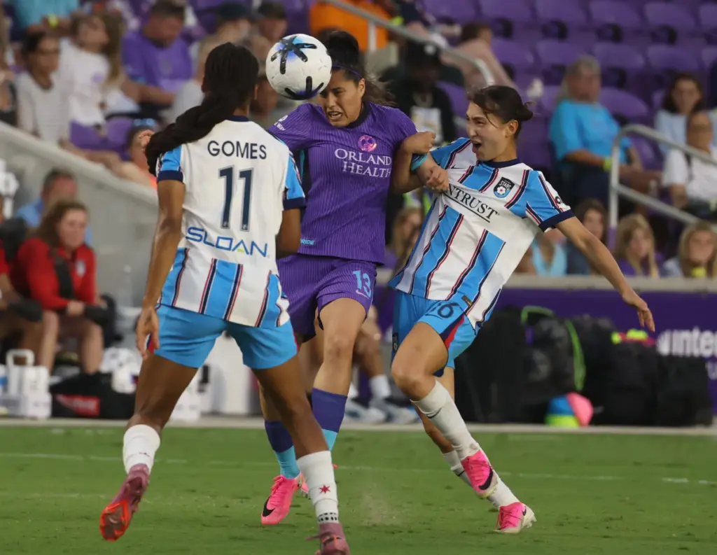 Orlando player Jacquie Ovalle (13) heads the ball between Chicago...