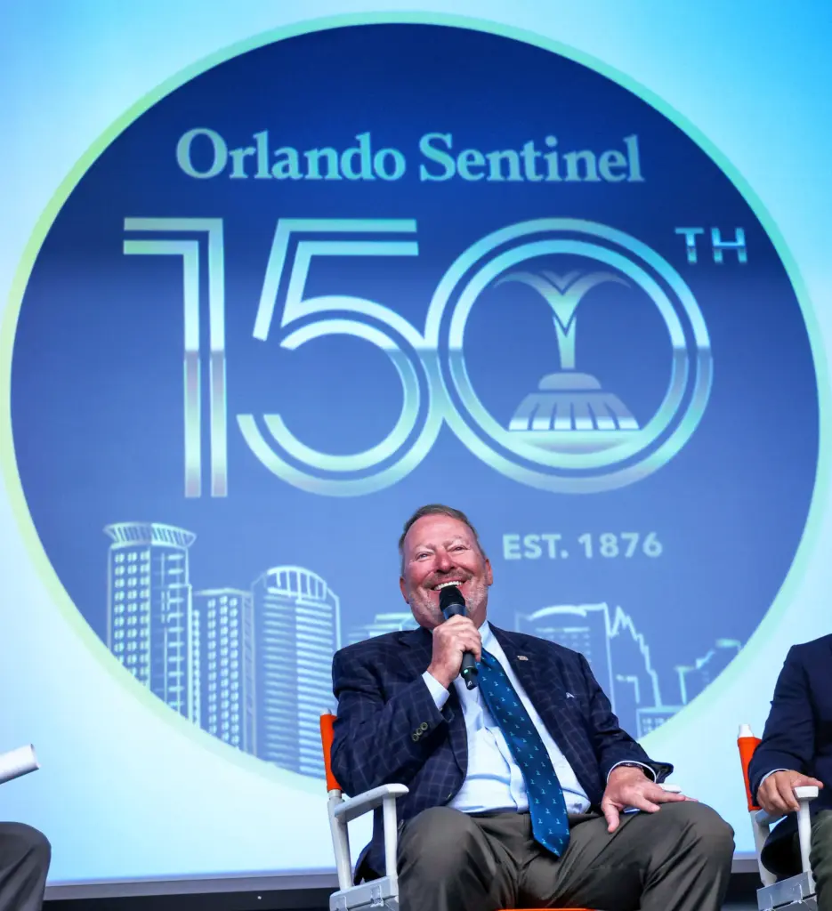 DISCUSSING DOWNTOWN â Orlando mayor Buddy Dyer answers a question...