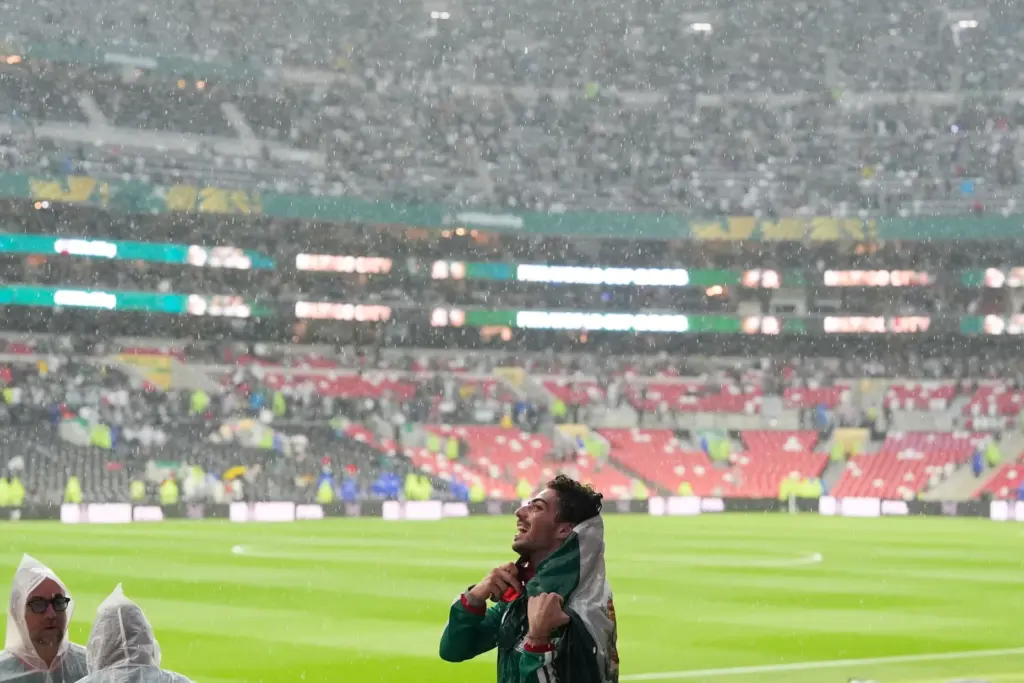 A fan reacts before the World Cup round of 32...