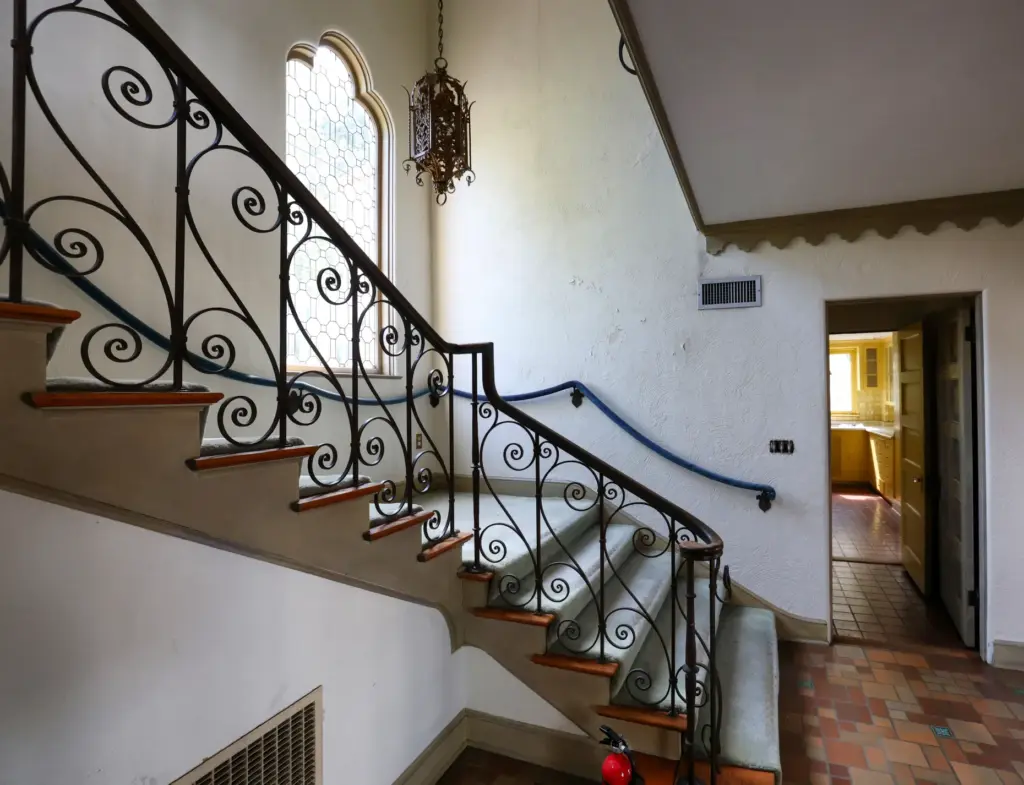 Carpeted stairs in Merrywood, the 7,300-square-foot, 3.7-acre estate designed by...