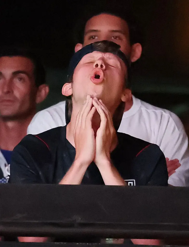 A USA soccer fan can't bear to watch during a...