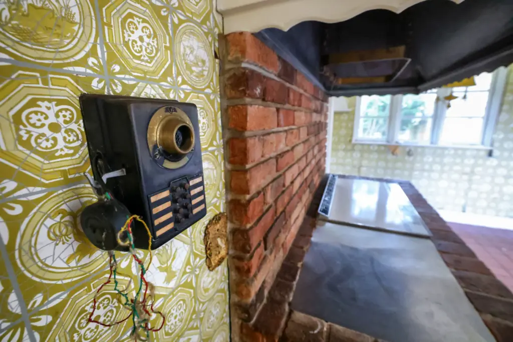 A vintage intercom device in the kitchen of Merrywood, the...