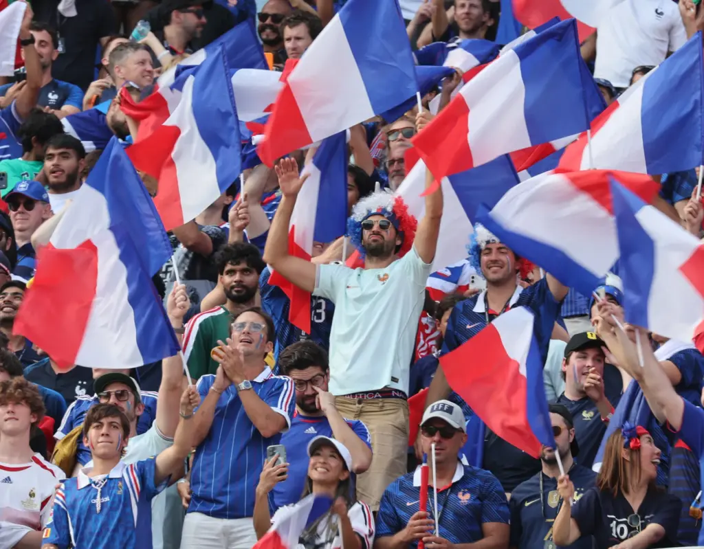 Foxboro, MA – July 9 – French fans celebrate their...