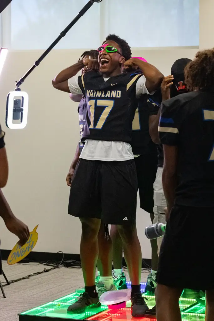 Player from Mainland High School poses for a 360 video...
