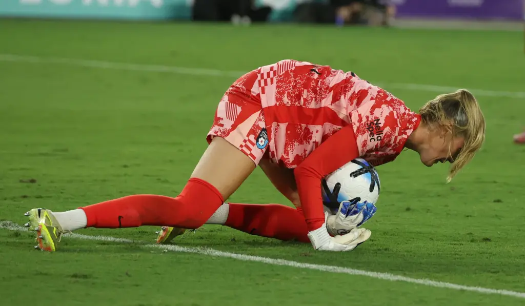 Chicago goalkeeper Katie Atkinson makes a stop during the Chicago...